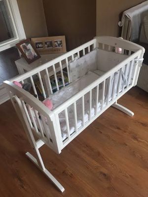 Mothercare swing crib deals