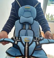Gambar A quua boo Baby seatbelt car